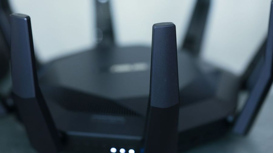 Wireless router with multiple antennas and glowing status lights