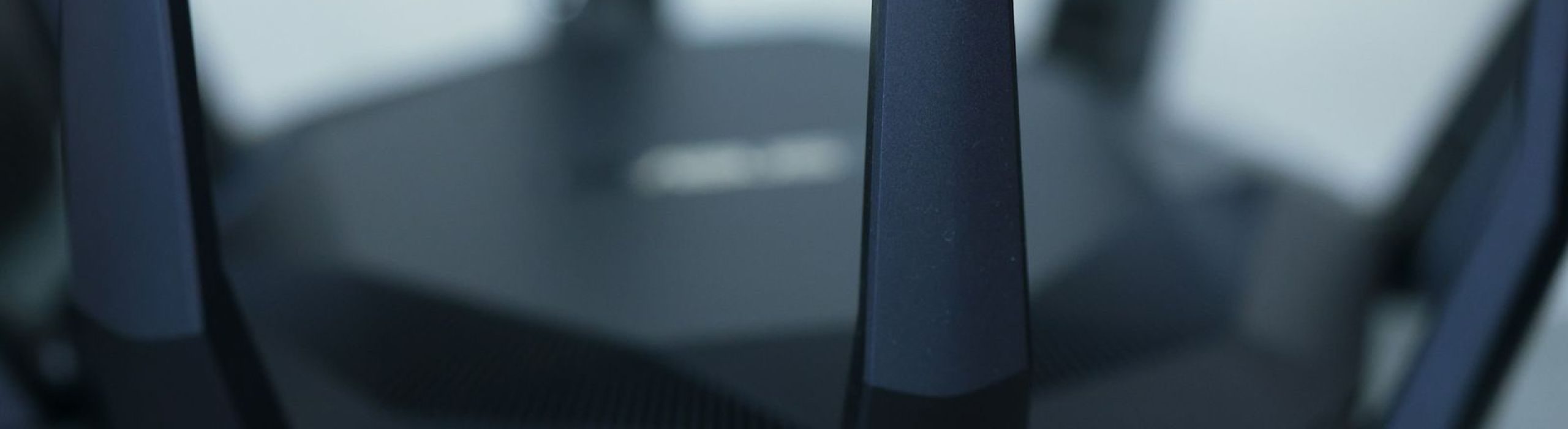 Wireless router with multiple antennas and glowing status lights